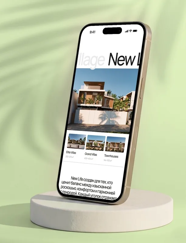 The New Life Village section on a phone standing on a white plinth